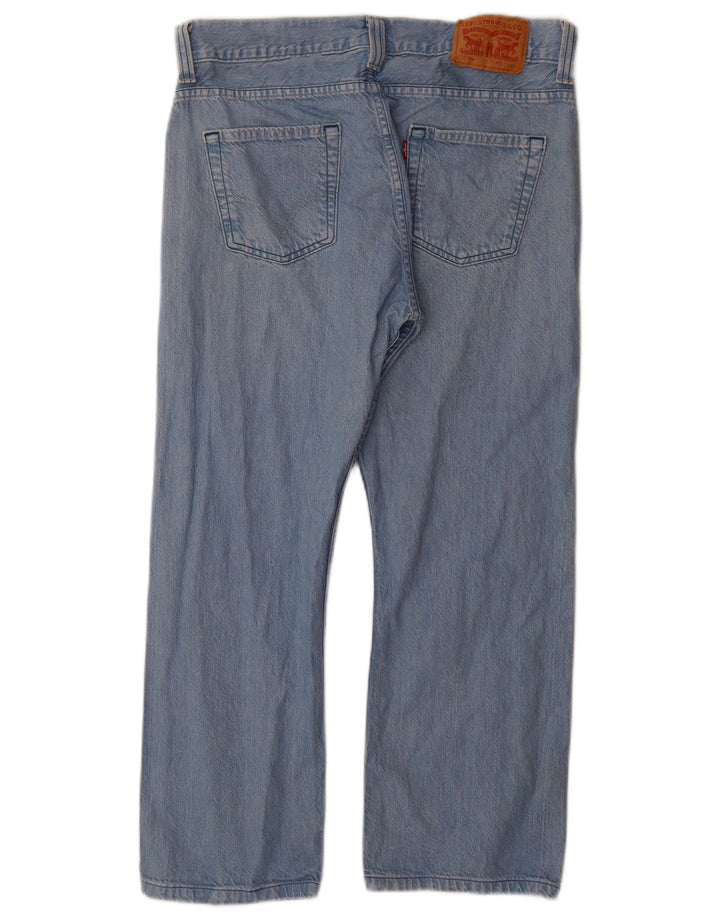 Męskie jeansy Levi's 506 Straight W34 L29 Niebieskie bawełniane
