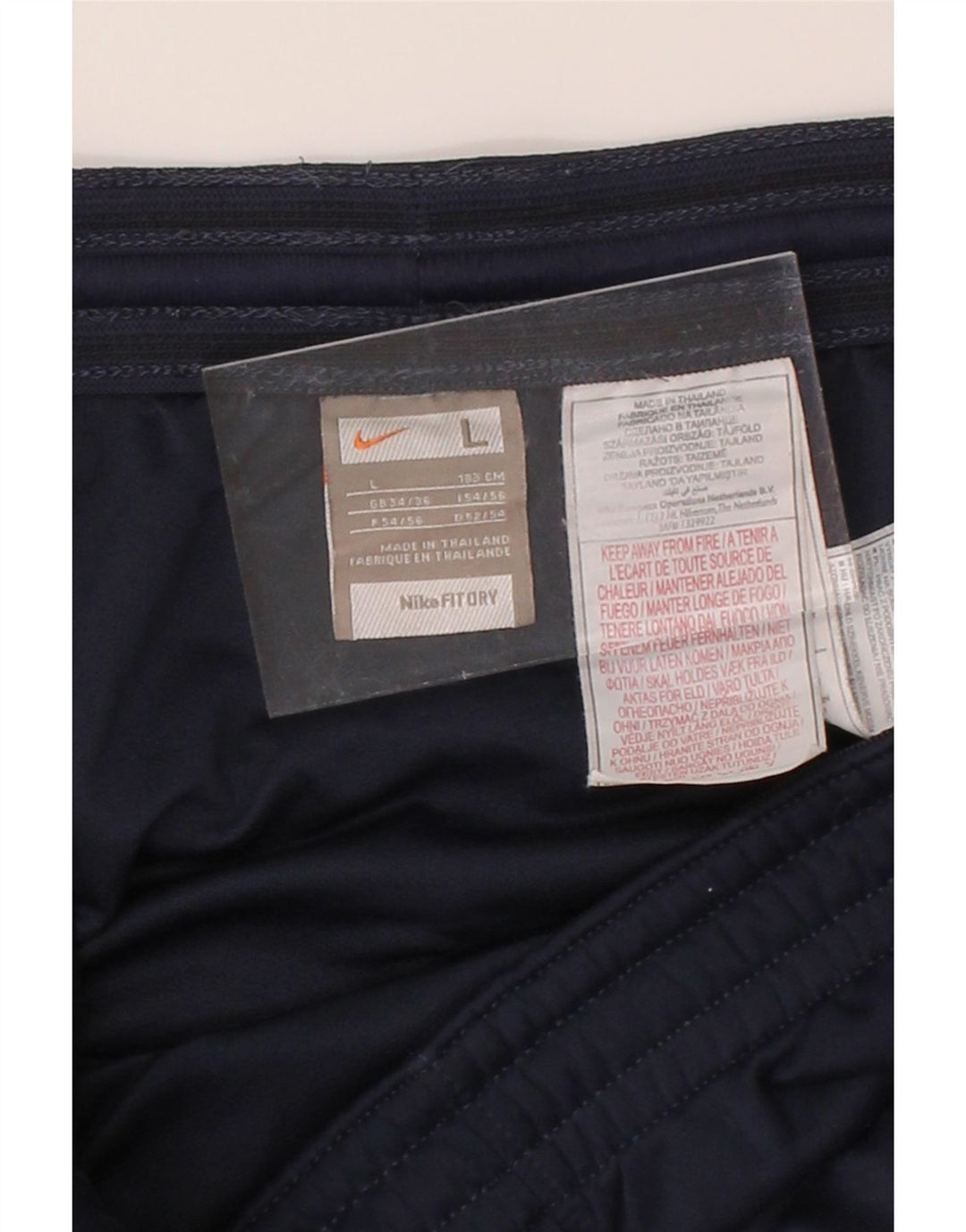 NIKE Mens Sport Shorts Large  Navy Blue Colourblock Polyester Vintage Nike and Second-Hand Nike from Messina Hembry 