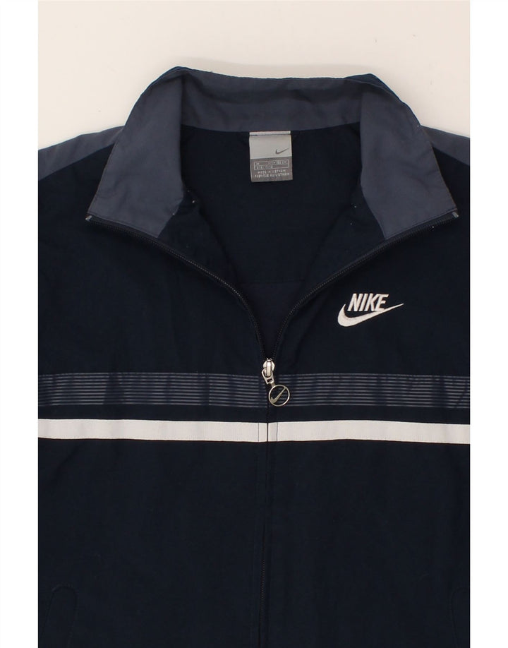 NIKE Boys Graphic Tracksuit Top Jacket 10-11 Years Medium Navy Blue Vintage Nike and Second-Hand Nike from Messina Hembry 