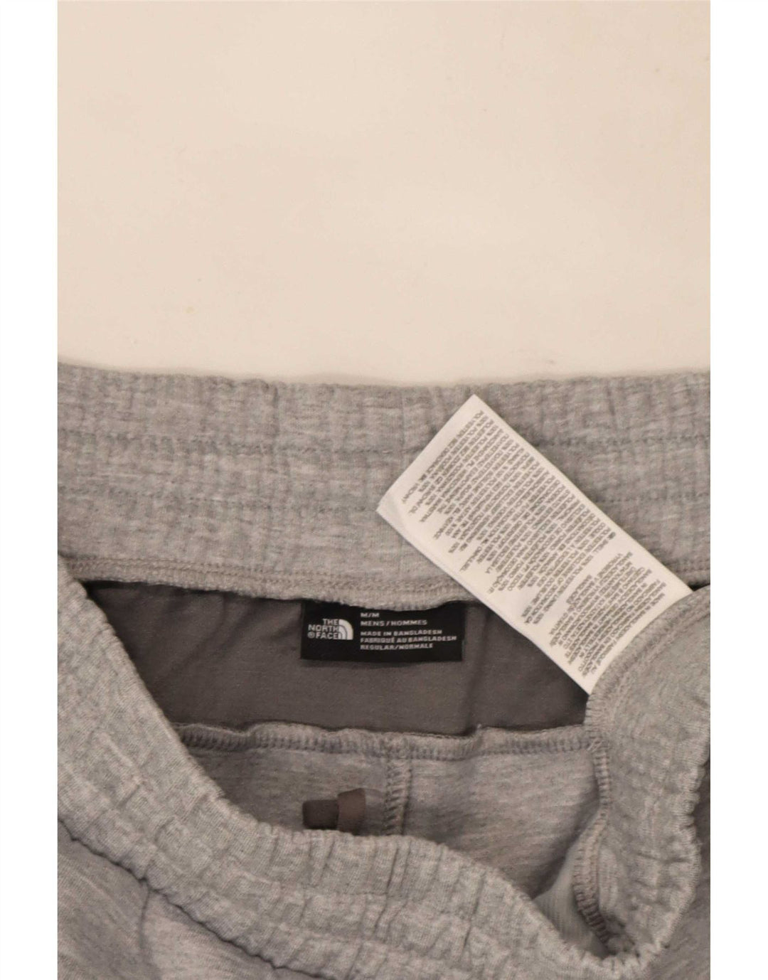 Męskie spodnie dresowe The North Face Joggers w kolorze średnioszarym