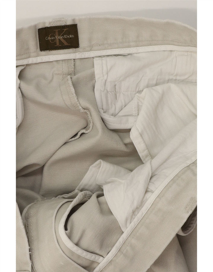 Męskie spodnie Chino Bootcut Calvin Klein W34 L32 Beżowe