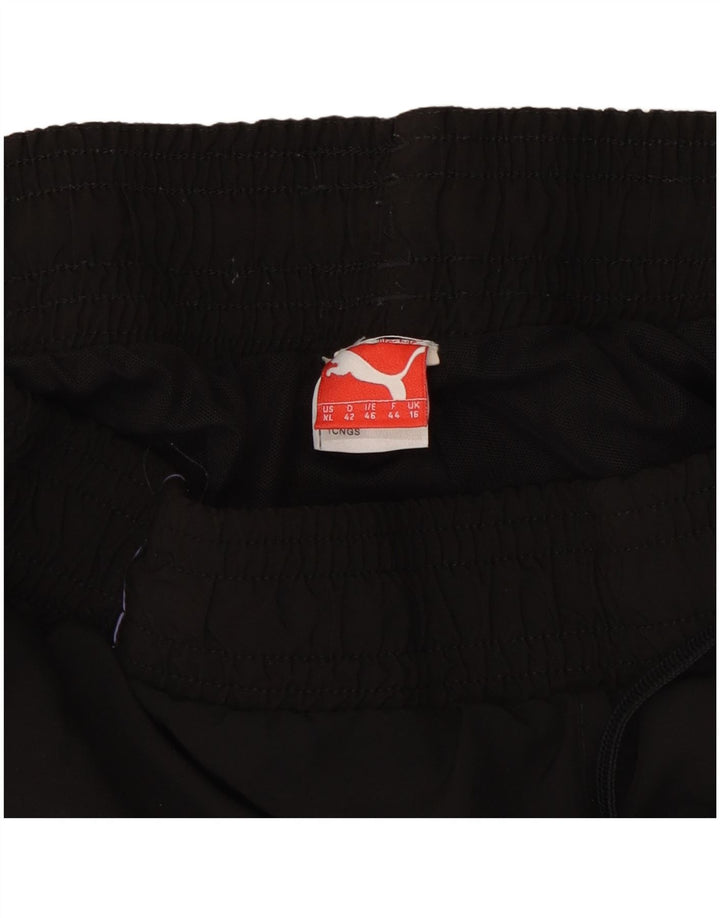 Damskie spodnie dresowe Puma UK 16, duże, czarne