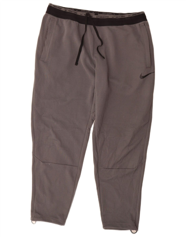 Męskie spodnie dresowe Nike Dri Fit 2XL, szary poliester z blokami kolorów