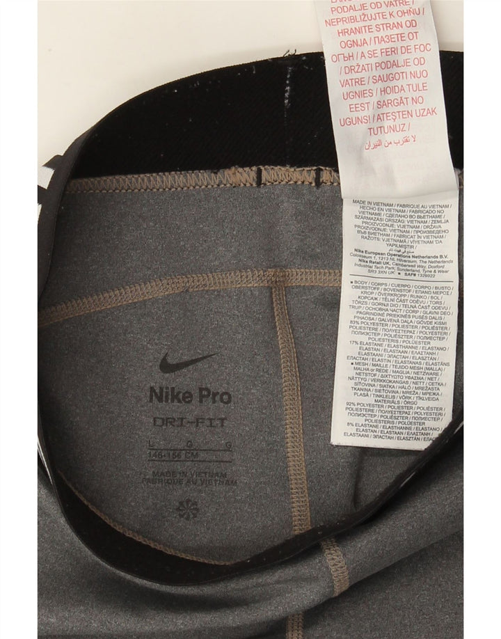 Dziewczęce legginsy z grafiką Nike w wieku 12–13 lat, duże, szare, z blokami kolorów, poliestrowe