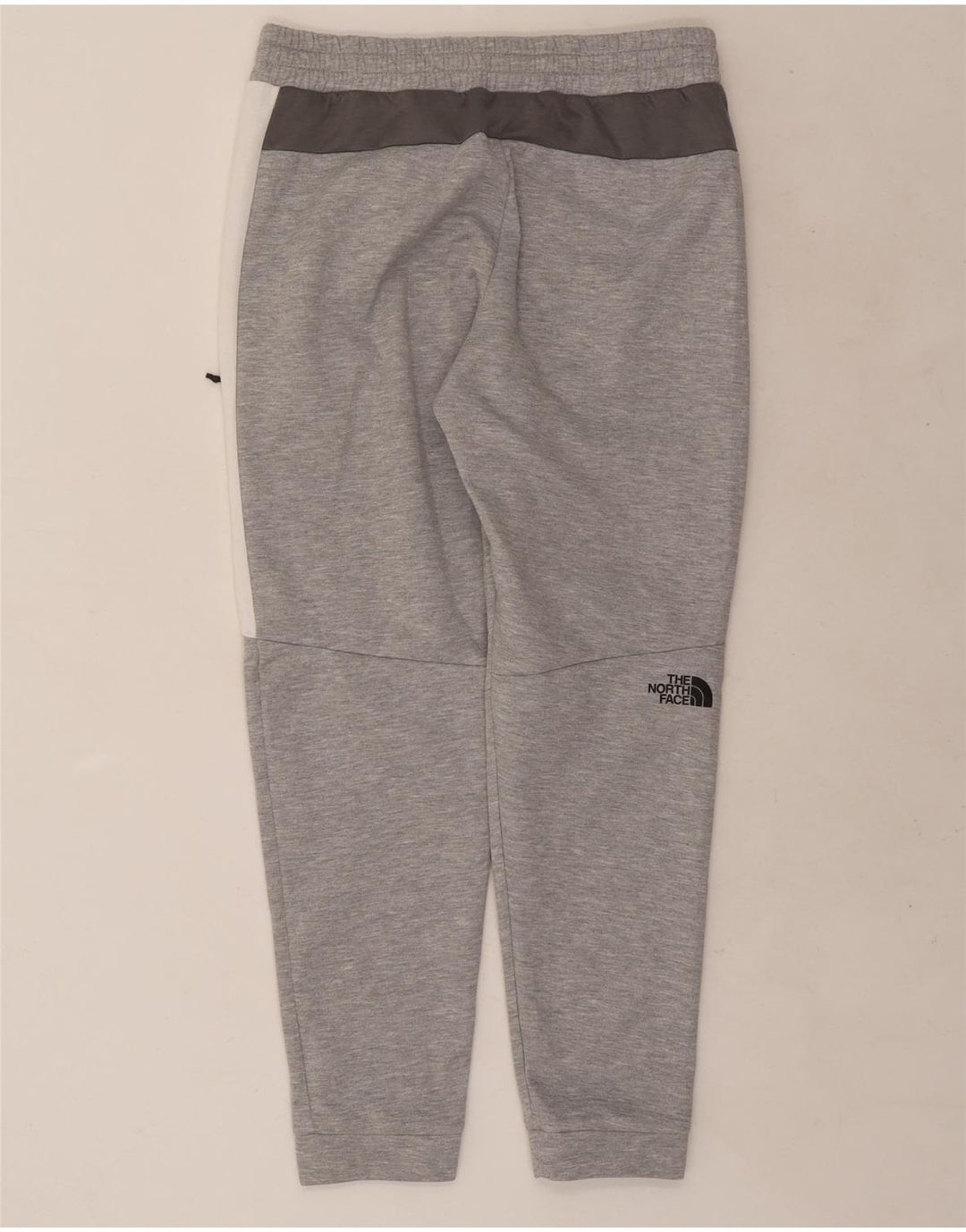 Męskie spodnie dresowe The North Face Joggers w kolorze średnioszarym