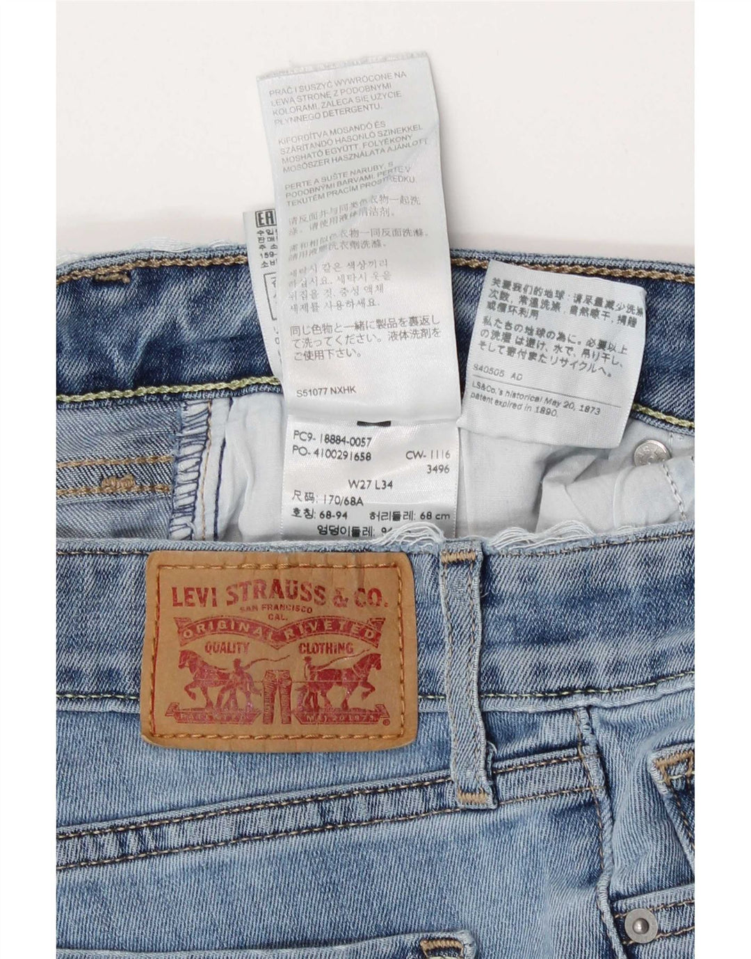 Damskie jeansy Levi's 712 Slim W27 L34 Niebieskie bawełniane