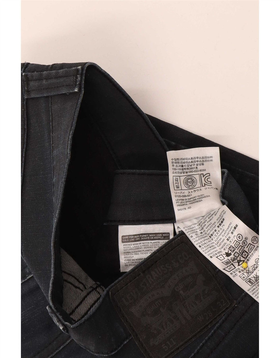 Męskie jeansy Levi's 511 Slim W28 L32 Granatowa bawełna