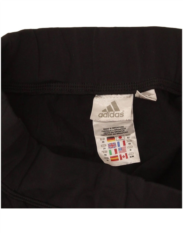 Damskie legginsy Adidas Capri UK 14, duży czarny poliester z blokami kolorów