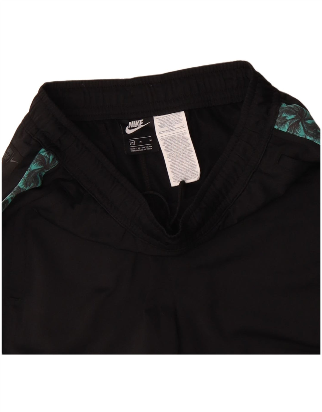 Męskie spodnie dresowe NIKE z grafiką, poliester w kolorze średniej czerni, w blokach kolorystycznych