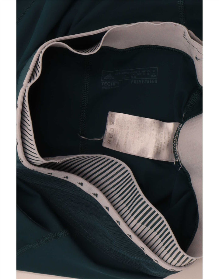 Damskie legginsy Adidas Graphic UK 12/14 Średni zielony poliester z blokami kolorów