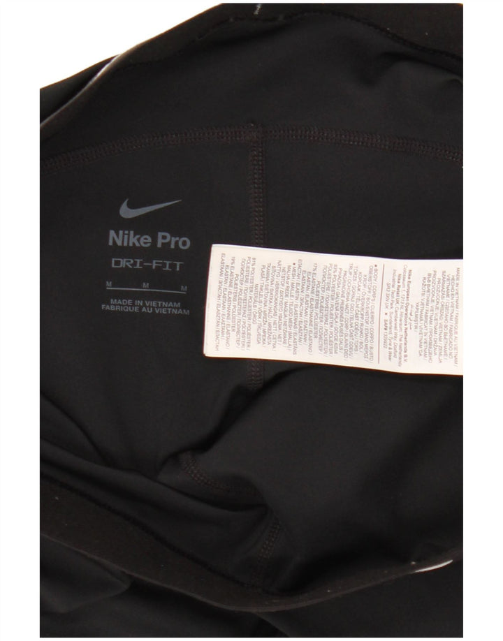 Damskie legginsy Nike Dri Fit Graphic UK 12, średni czarny poliester