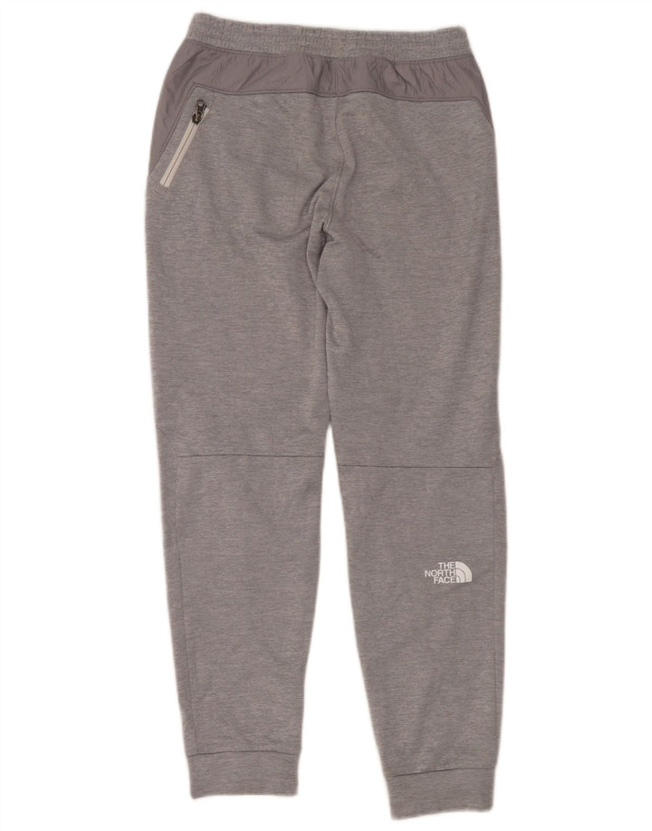 Męskie spodnie dresowe The North Face Joggery w kolorze średnioszarym, z poliestru