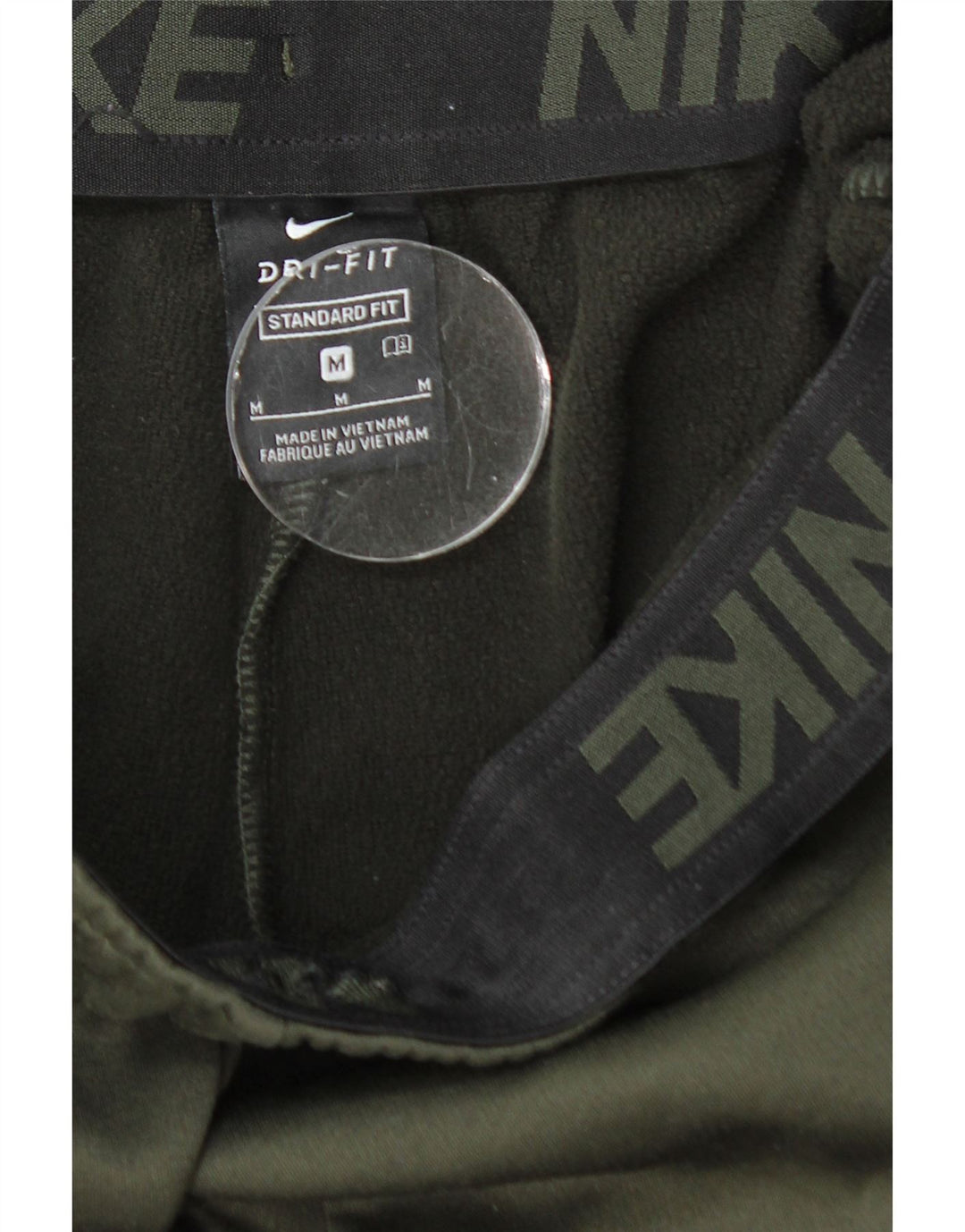 Męskie spodnie dresowe NIKE Dri Fit o standardowym kroju, średnie khaki