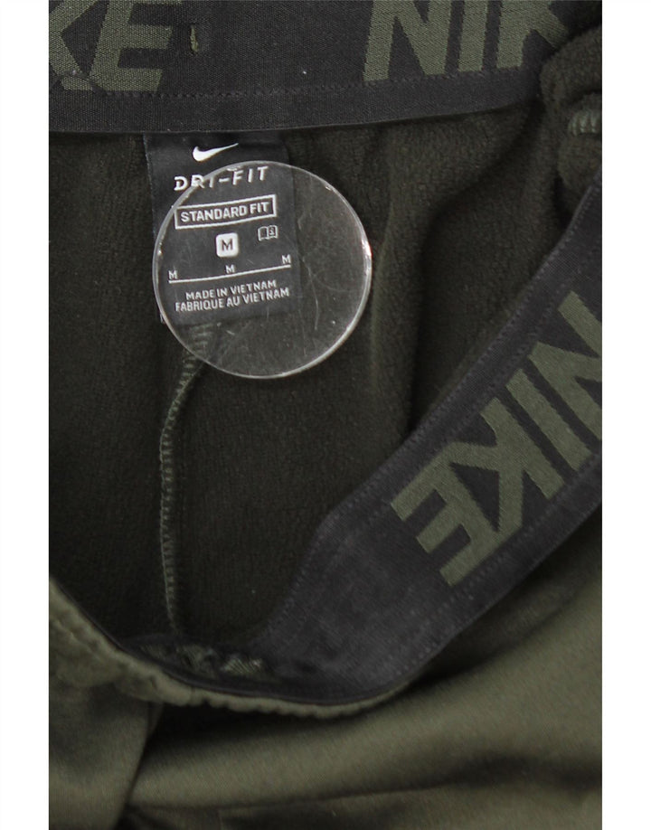 Męskie spodnie dresowe NIKE Dri Fit o standardowym kroju, średnie khaki