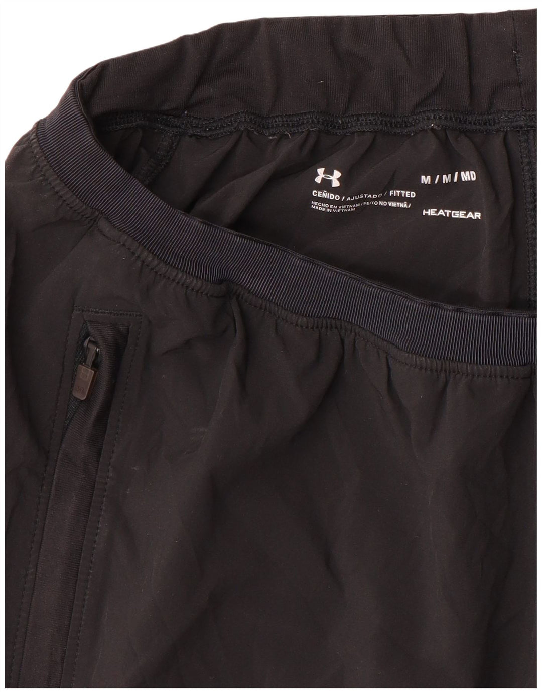 Damskie spodnie dresowe Under Armour Heat Gear w kolorze średniej czerni