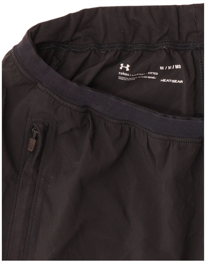 Damskie spodnie dresowe Under Armour Heat Gear w kolorze średniej czerni