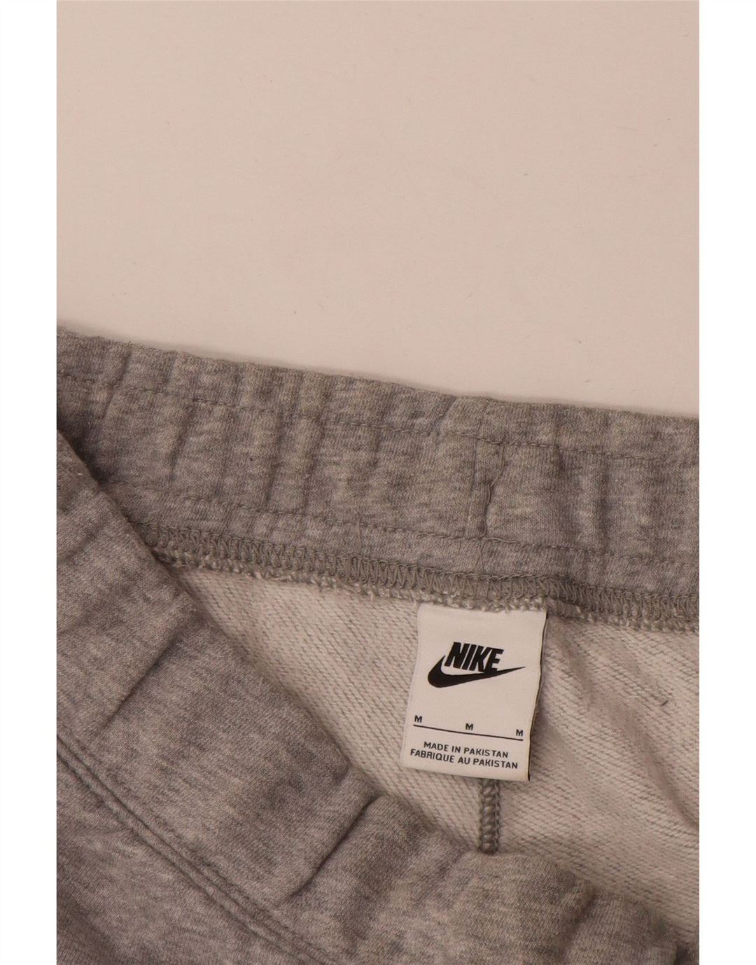 Męskie spodnie dresowe Nike Graphic Dresy Joggery w kolorze średnioszarym