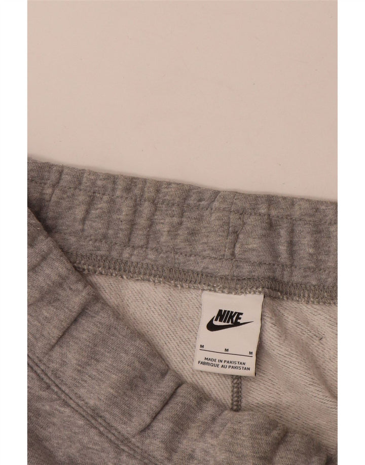 Męskie spodnie dresowe Nike Graphic Dresy Joggery w kolorze średnioszarym