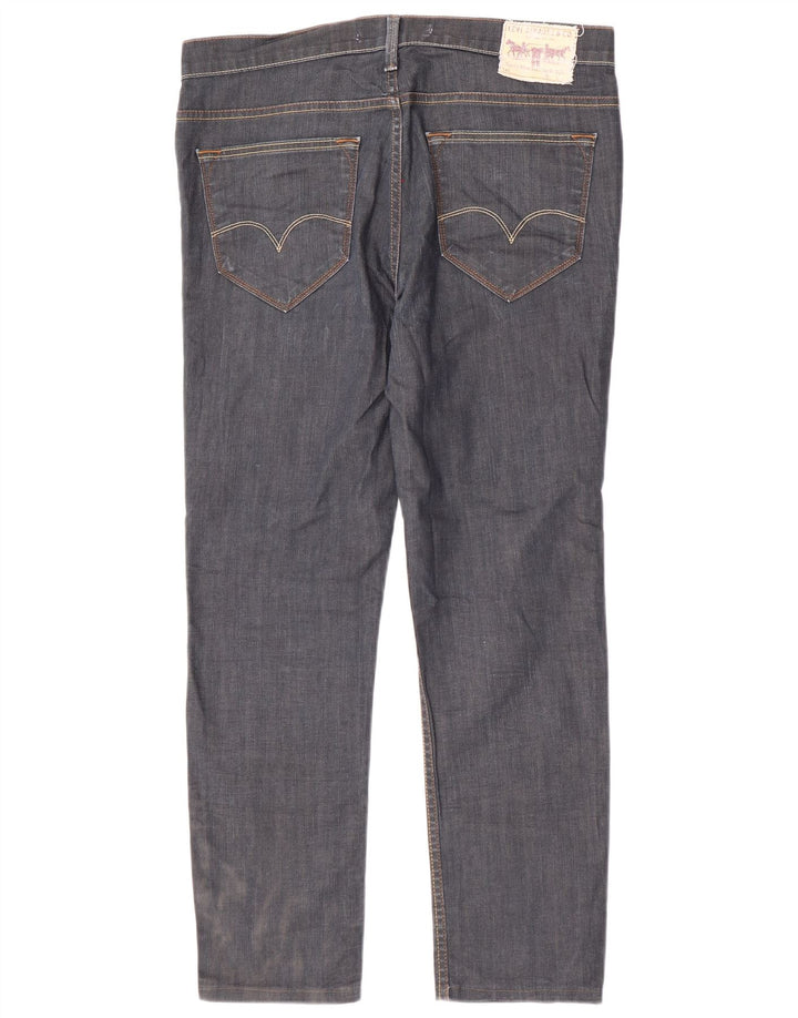 Męskie jeansy Levi's 519 Slim W36 L29 Granatowa bawełna