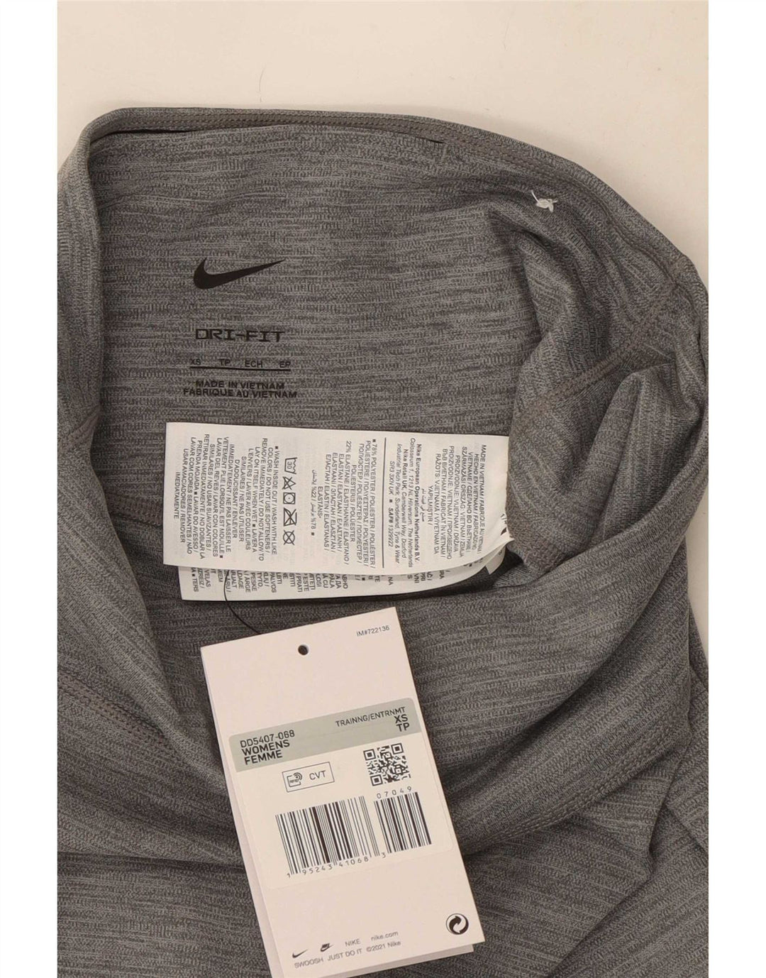 Damskie legginsy Nike Dri Fit Graphic UK 4 XS Szary, nakrapiany poliester