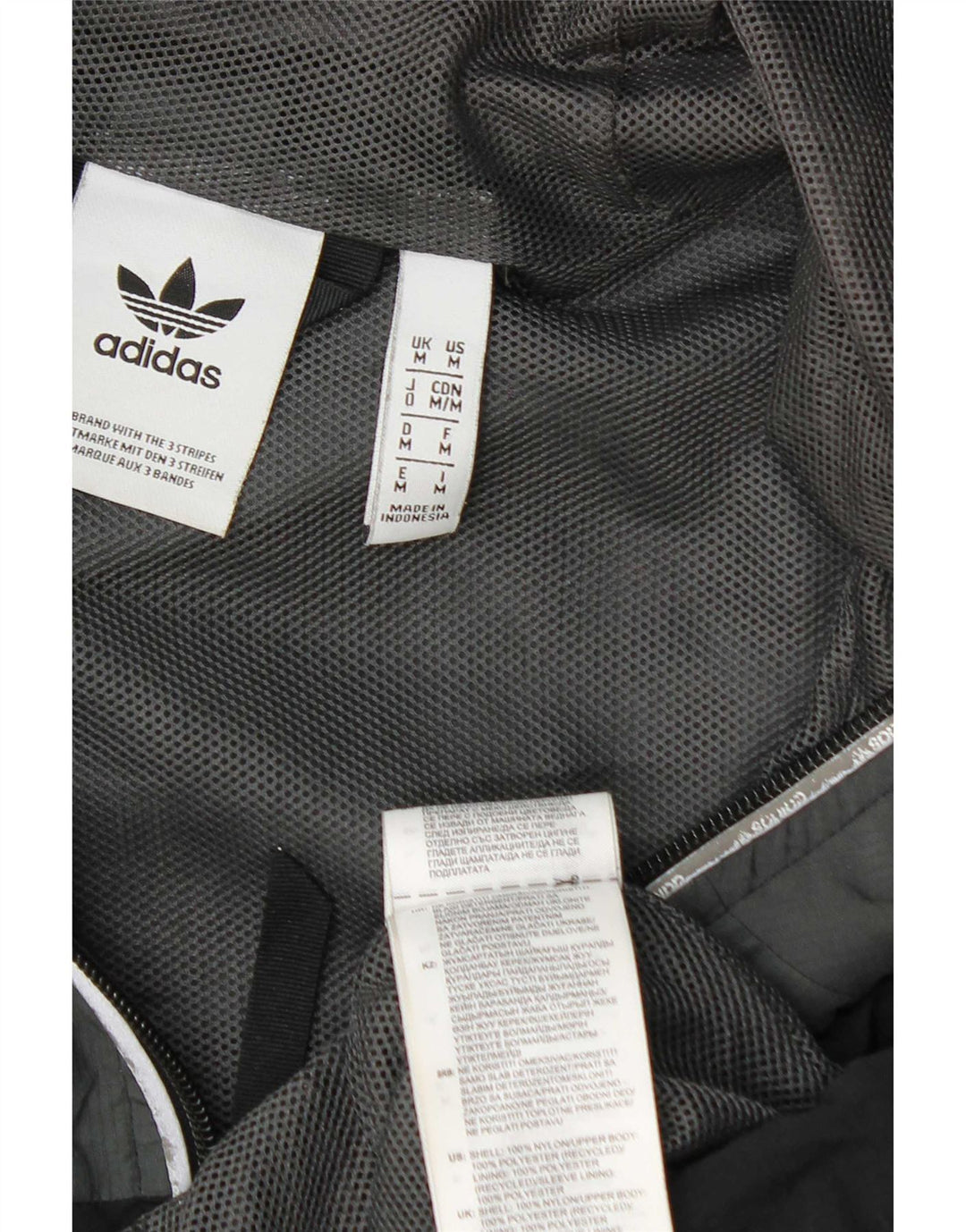Męska kurtka przeciwdeszczowa Adidas z kapturem UK 38 Średni szary nylon z blokami kolorów