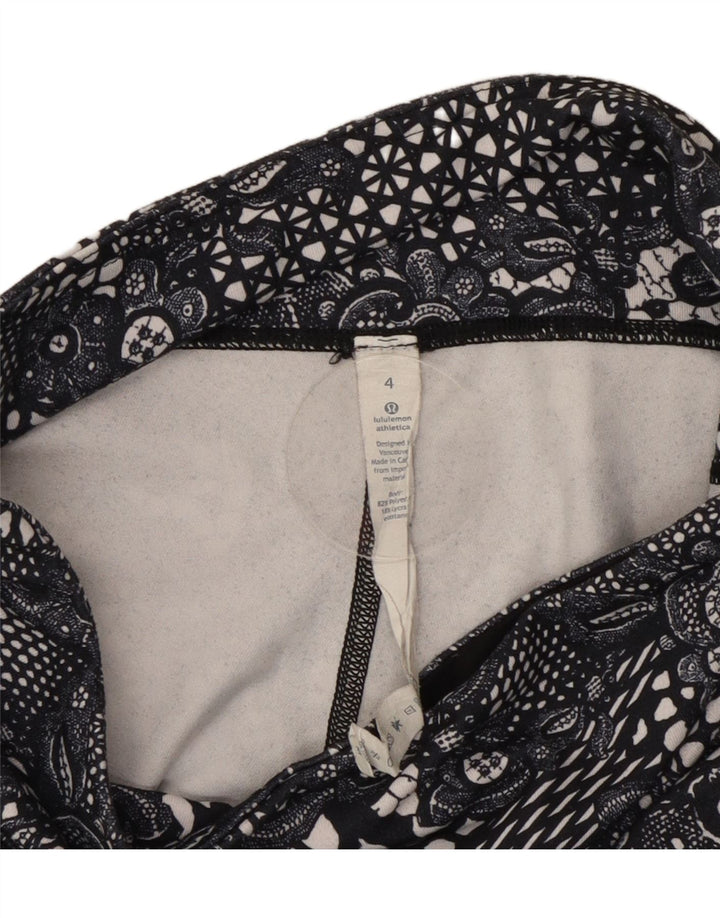 Damskie legginsy Capri Lululemon US 4, małe, czarne, z poliestru w kwiaty