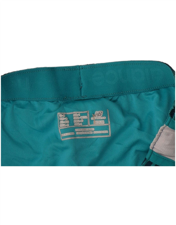 Damskie spodenki sportowe NEW BALANCE UK 14, średnie granatowe paski