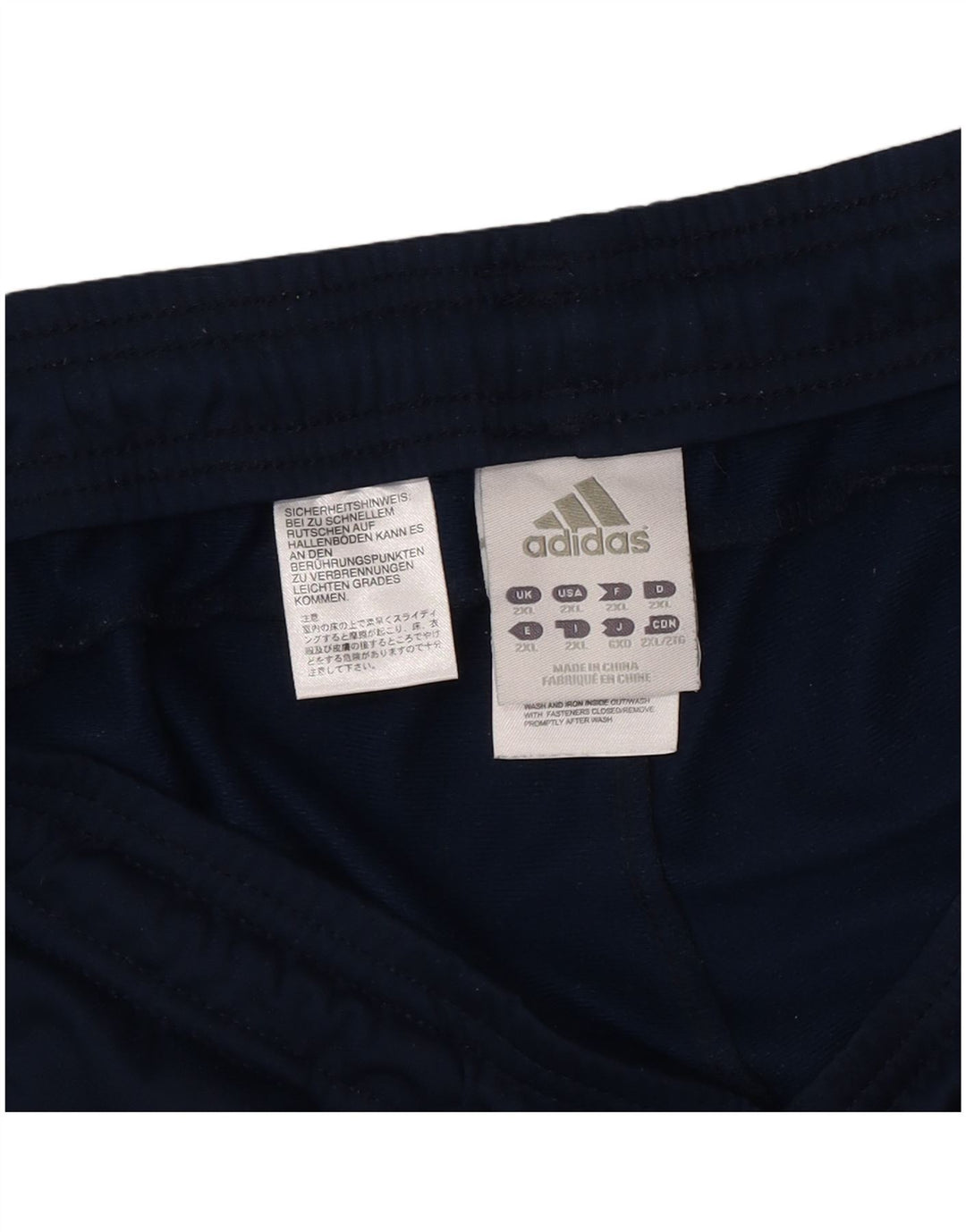 Męskie spodnie dresowe Adidas 2XL Granatowy poliester z blokami kolorów