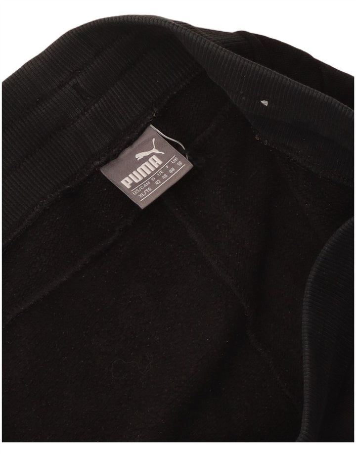 Damskie spodnie dresowe Puma Joggers UK 16, duże czarne