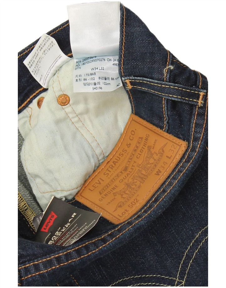 Męskie jeansy LEVI'S 502 Tapered W34 L32 Granatowa bawełna
