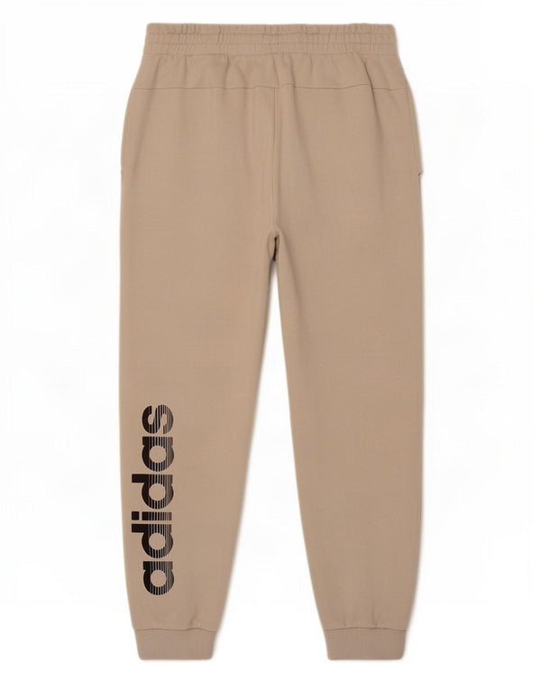 Damskie spodnie dresowe Adidas Graphic Joggers UK 16/18 Large Beige