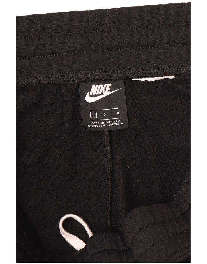 Męskie spodnie dresowe Nike, duże czarne bloki kolorów