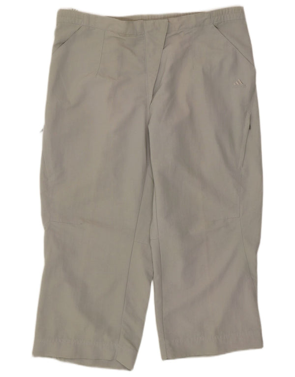 Damskie spodnie dresowe ADIDAS Capri UK 14, średnio zielone, sportowe z poliamidu