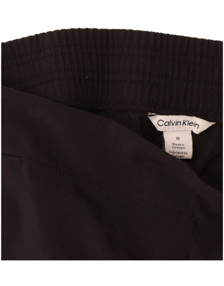 Damskie spodnie dresowe Calvin Klein Joggers UK 14 Średni czarny poliester