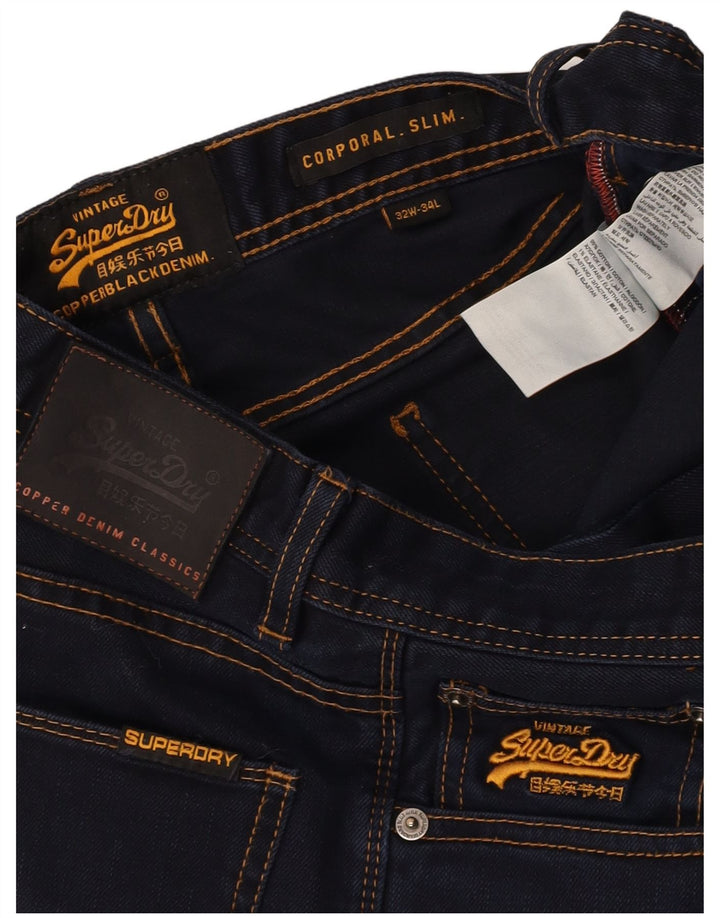SUPERDRY Męskie jeansy typu corporal slim W32 L34 Granatowa bawełna