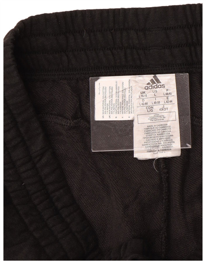 Damskie spodnie dresowe ADIDAS Graphic Joggers UK 16/18, duże czarne