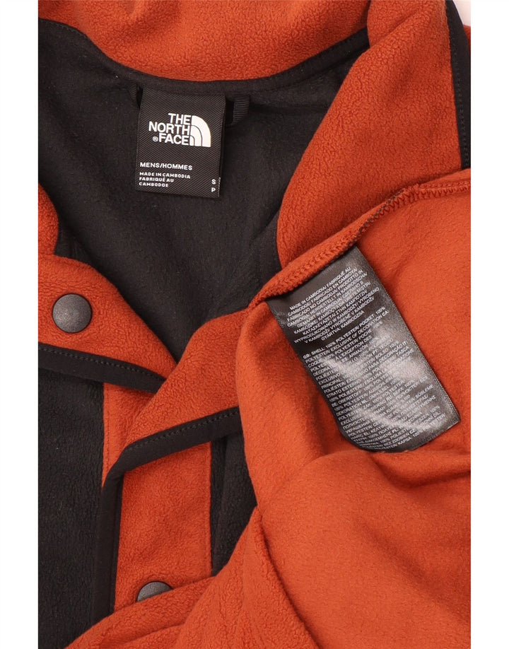 Męski sweter polarowy The North Face z guzikami pod szyją, w małych pomarańczowych blokach kolorów