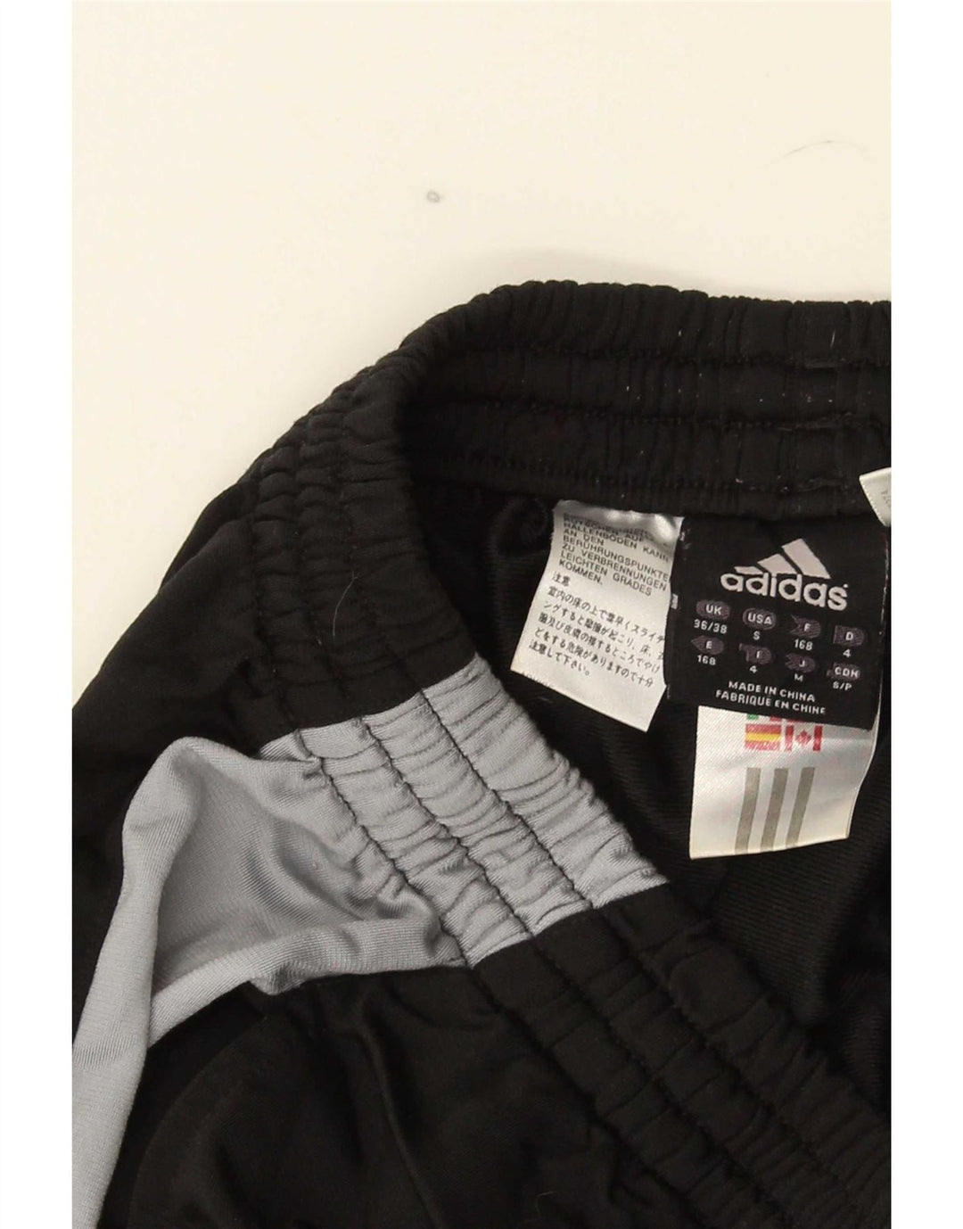 Męskie spodnie dresowe Adidas UK 36/38 Mały czarny poliester z blokami kolorów