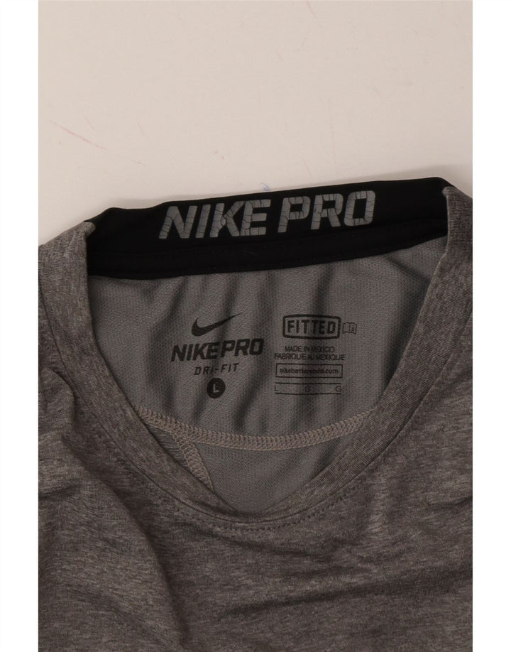 NIKE Womens Fitted T-Shirt Top UK 16 Large Grey Polyester Vintage Nike and Second-Hand Nike from Messina Hembry 