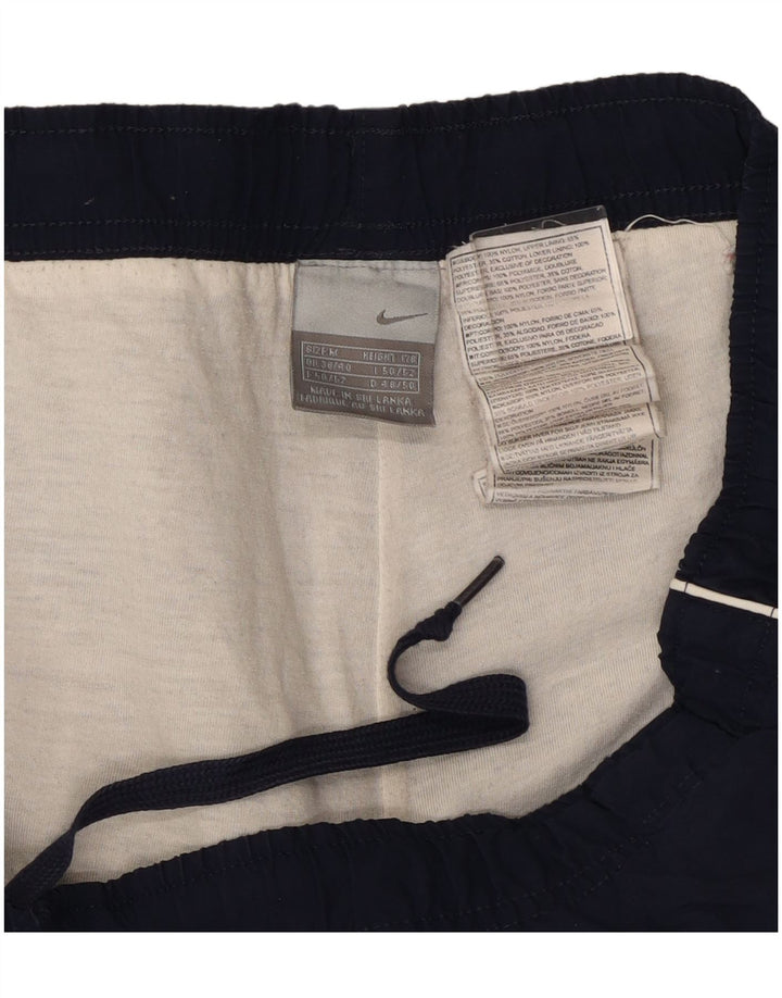 Męskie spodnie dresowe Nike UK 38/40 Średni granatowy nylon