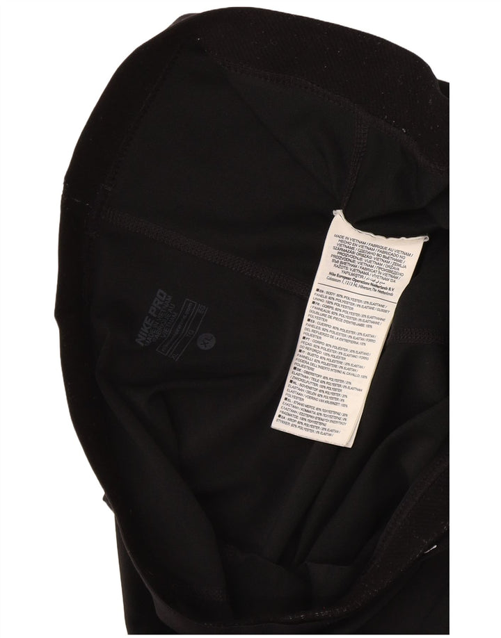 Damskie legginsy Nike Dri Fit Graphic Capri UK 18 XL, czarny poliester