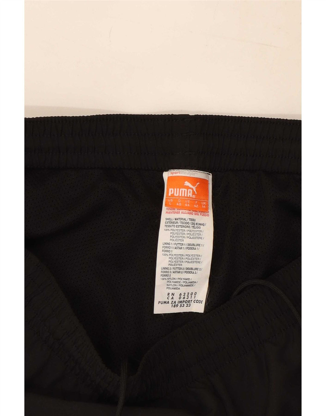 Damskie spodnie dresowe Puma UK 14, duże, czarne, poliestrowe
