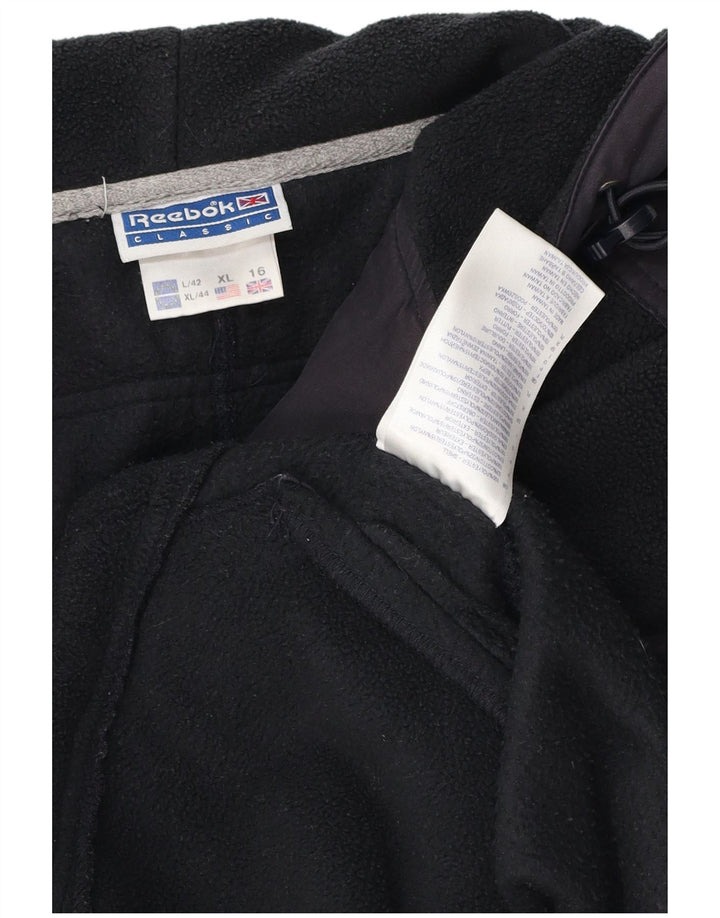 Damska kurtka polarowa oversize REEBOK UK 16, duża, czarna, z blokami kolorów