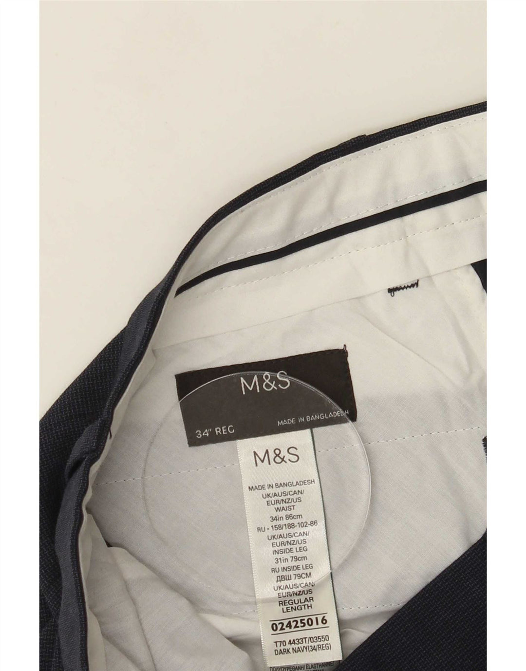 Męskie spodnie garniturowe Marks & Spencer W34 L30 Granatowy poliester