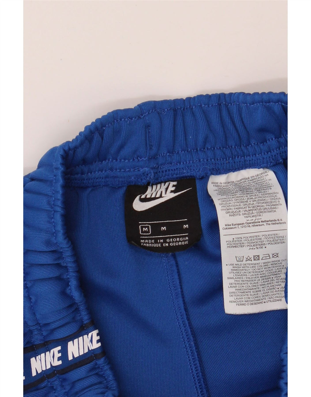 NIKE Mens Graphic Sport Shorts Medium Blue Polyester Vintage Nike and Second-Hand Nike from Messina Hembry 