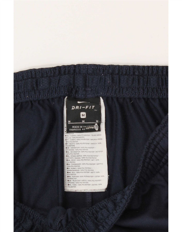 Męskie spodnie dresowe Nike Dri Fit, poliester w kolorze średniego granatu, w blokach kolorów