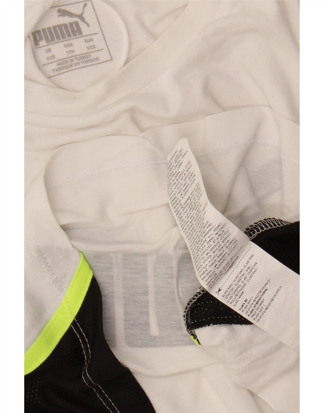 Damska koszulka PUMA Crop Oversize z grafiką Top UK 2 2XS Biała z blokami kolorów