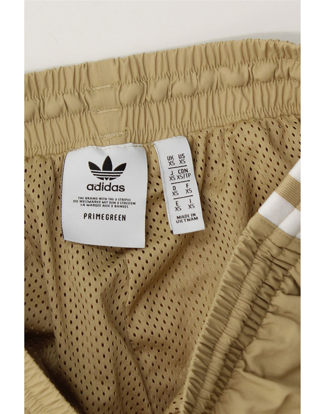 Męskie spodnie dresowe Adidas Joggers XS Beżowy poliamid
