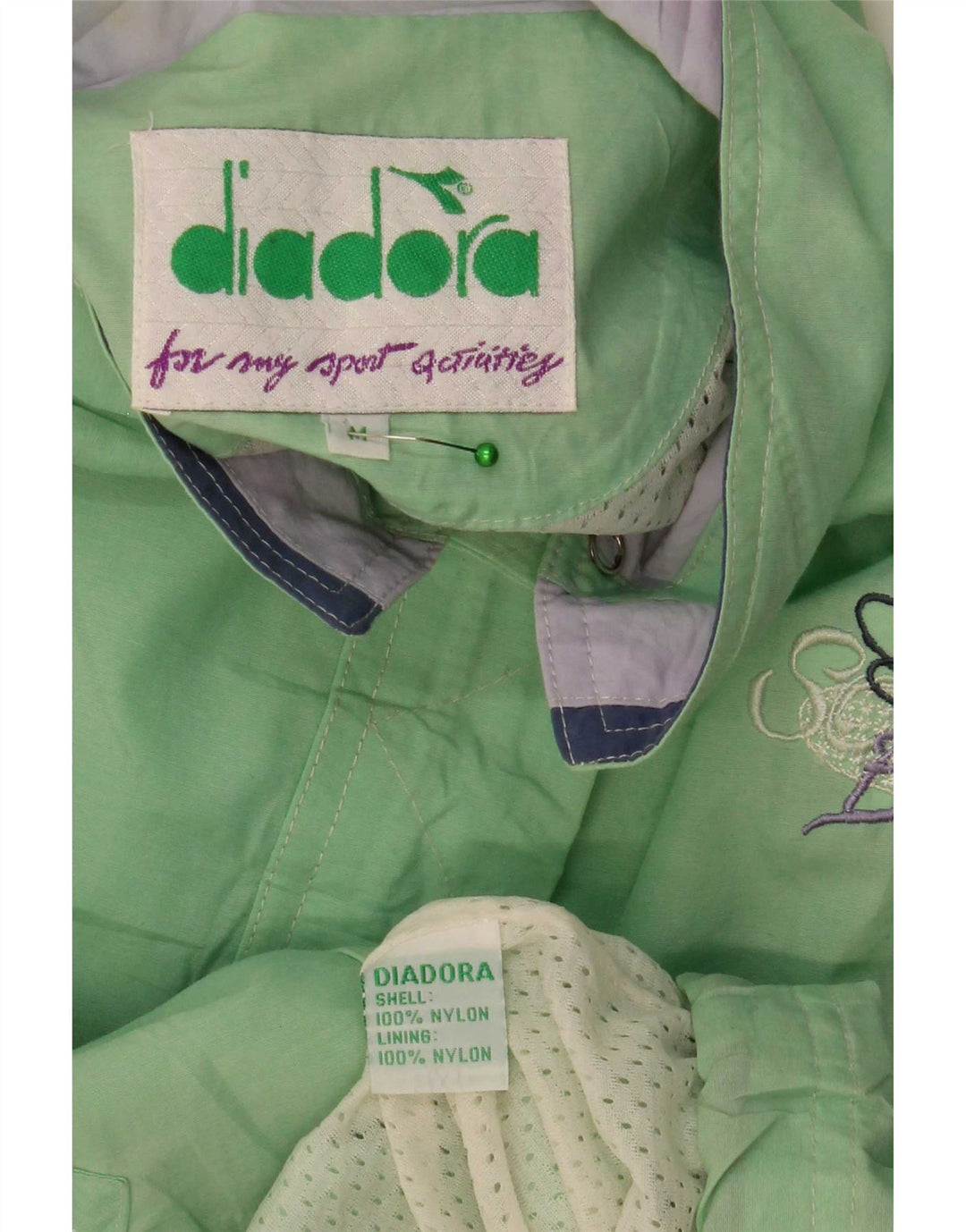 Damska, oversize'owa kurtka przeciwdeszczowa Diadora UK 14, średni zielony nylon