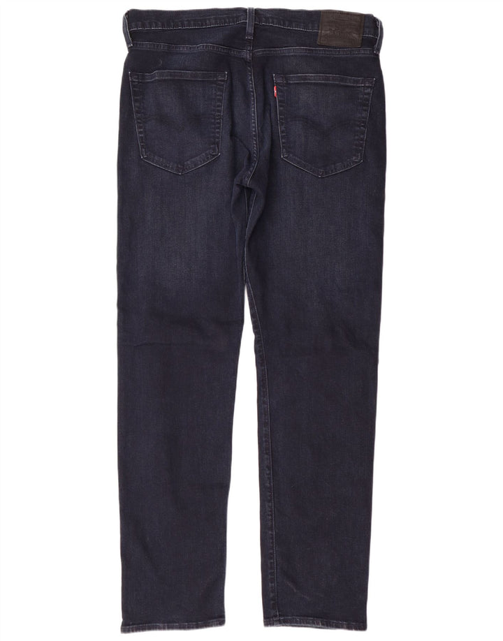 Męskie jeansy LEVI'S 502 Tapered W36 L32 Granatowa bawełna